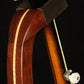 Folding bubinga rosewood and curly maple wood banjo floor stand yoke detail image with Alvarez banjo