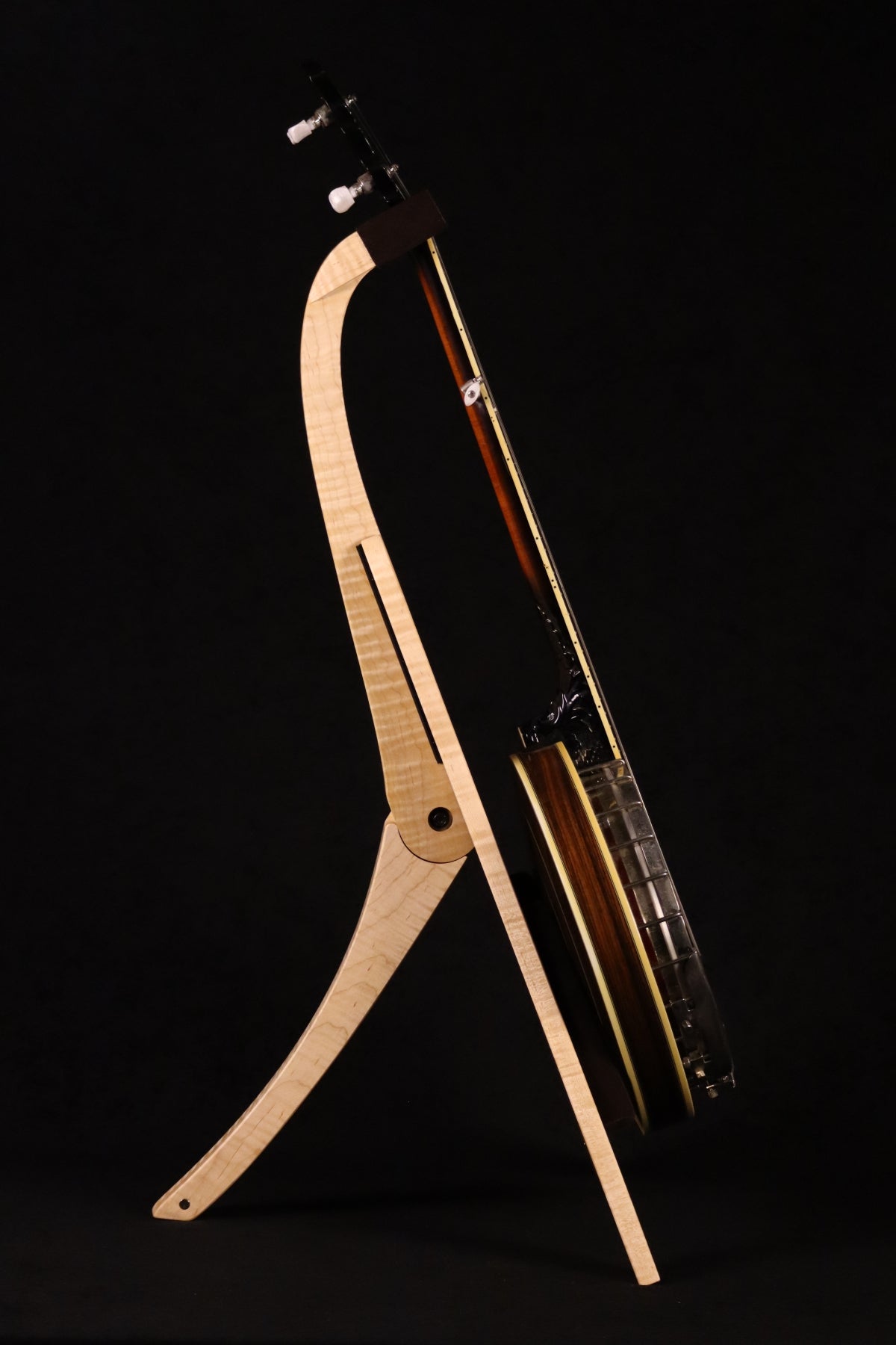 Folding curly maple wood banjo floor stand full side image with Alvarez banjo