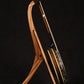 Folding sapele mahogany and curly maple wood banjo floor stand full side image with Alvarez banjo