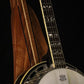 Folding sapele mahogany and curly maple wood banjo floor stand closeup front image with Alvarez banjo
