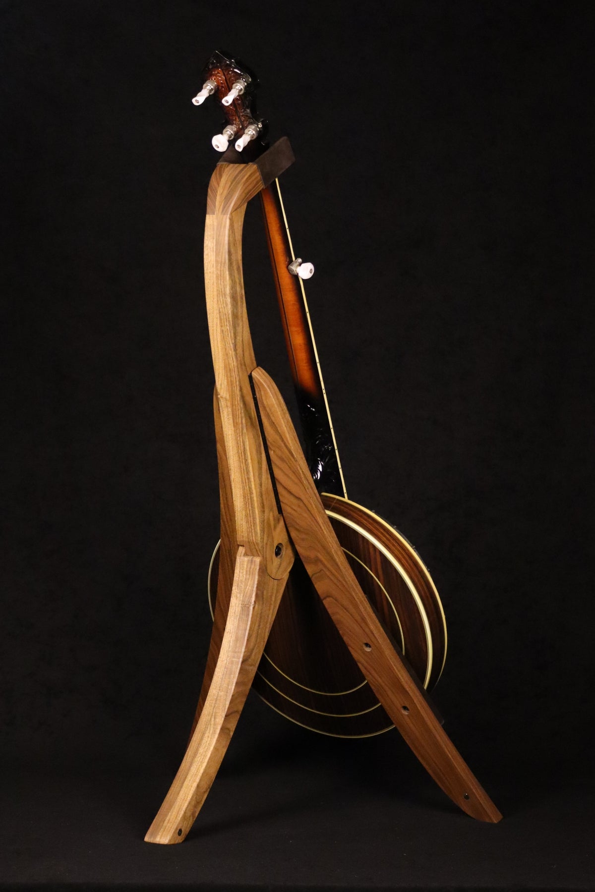 Folding walnut wood banjo floor stand full rear image with Alvarez banjo