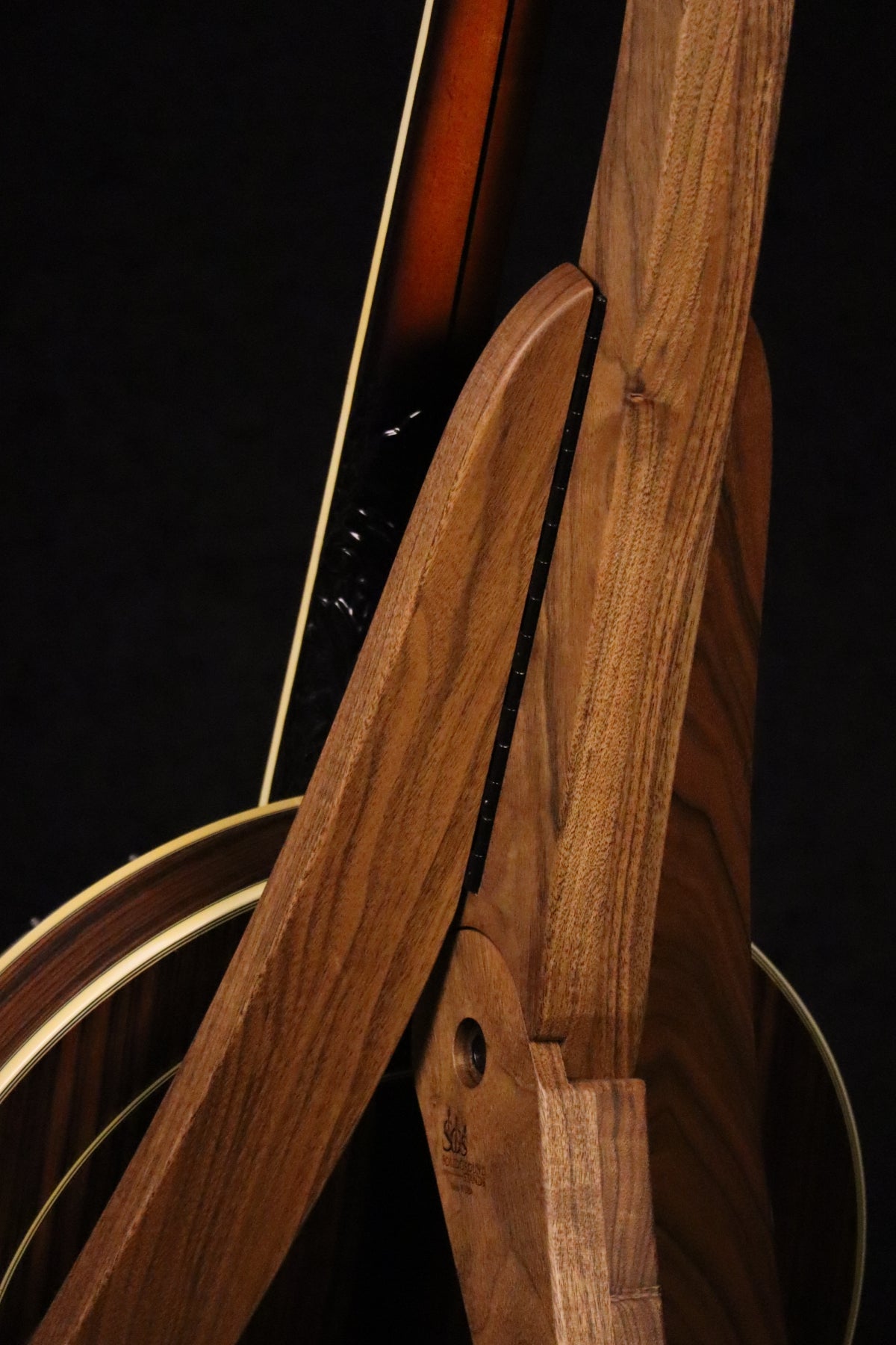 Folding walnut wood banjo floor stand closeup rear image with Alvarez banjo
