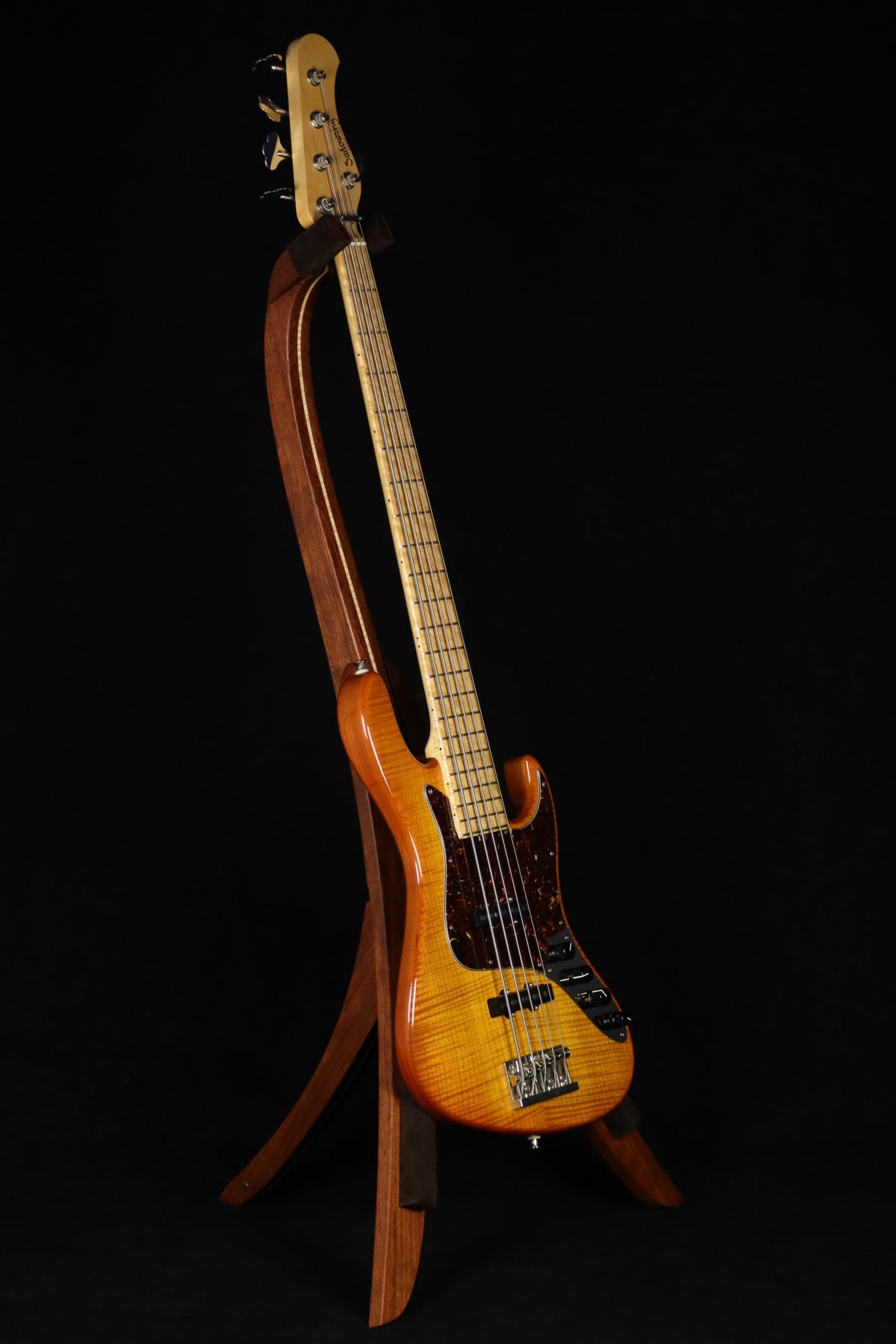 Folding bubinga rosewood and curly maple wood electric bass guitar floor stand full front image with Sadowsky 5 string bass
