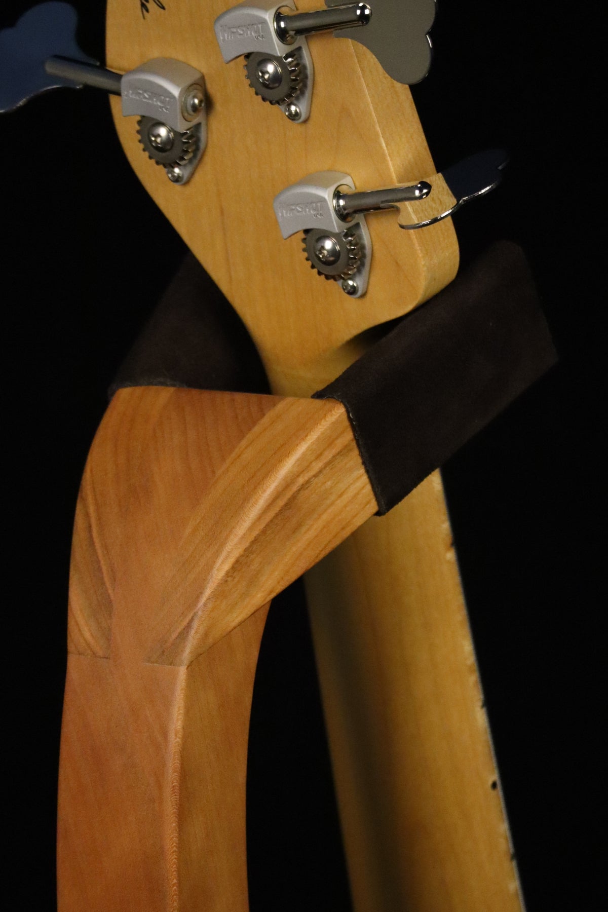 Folding cherry wood guitar floor stand closeup yoke detail image