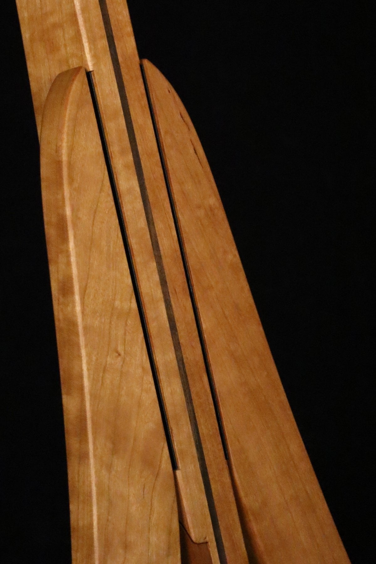 Folding cherry and walnut wood electric bass guitar floor stand closeup front image