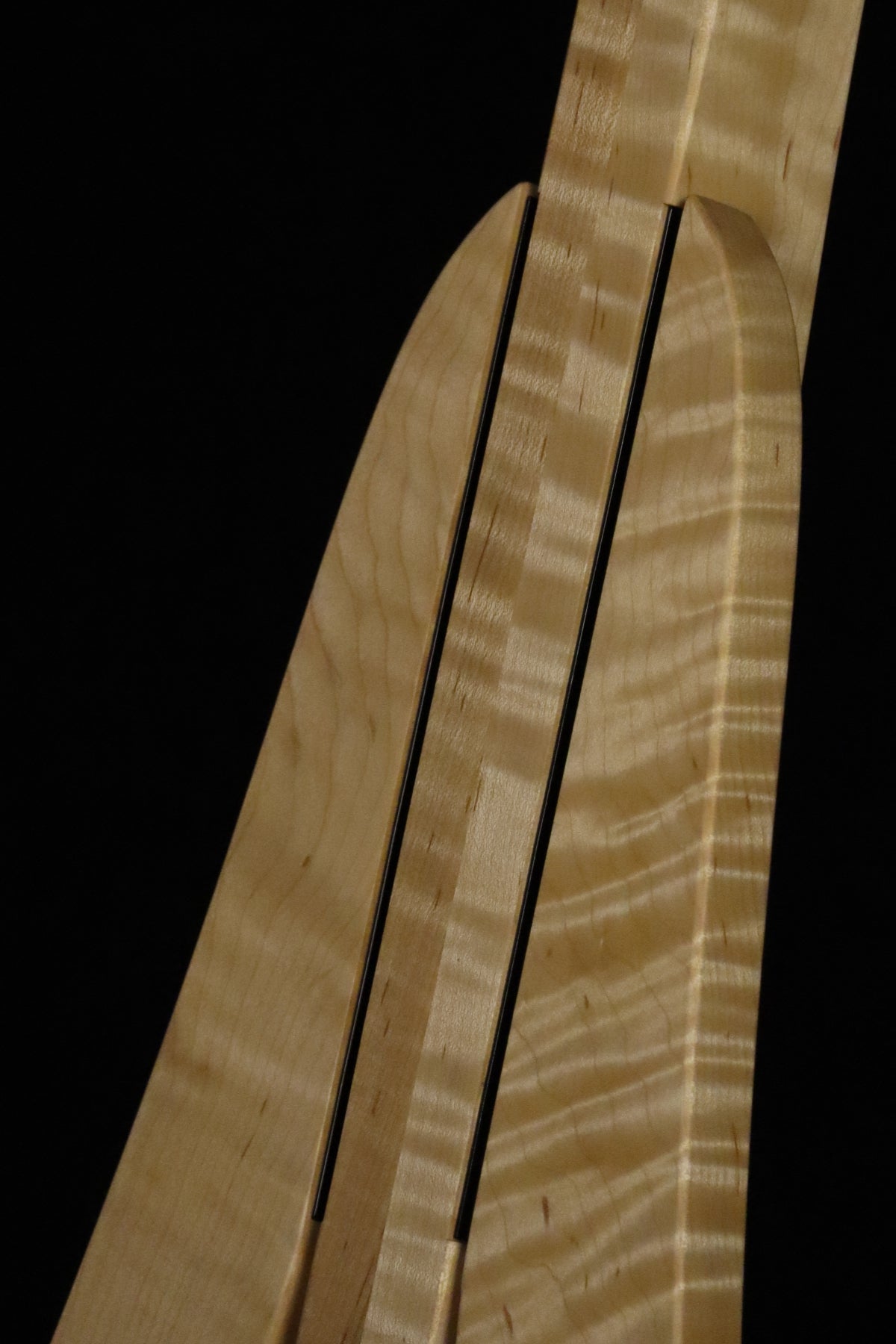Folding curly maple wood electric bass guitar floor stand closeup front image