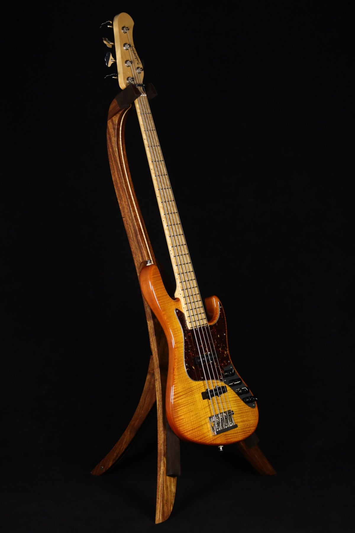 Folding chechen Caribbean rosewood and curly maple wood electric bass guitar floor stand full front image with Sadowsky 5 string bass