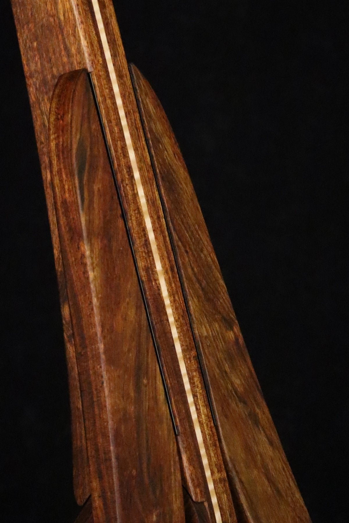 Folding chechen Caribbean rosewood and curly maple wood electric bass guitar floor stand closeup front image