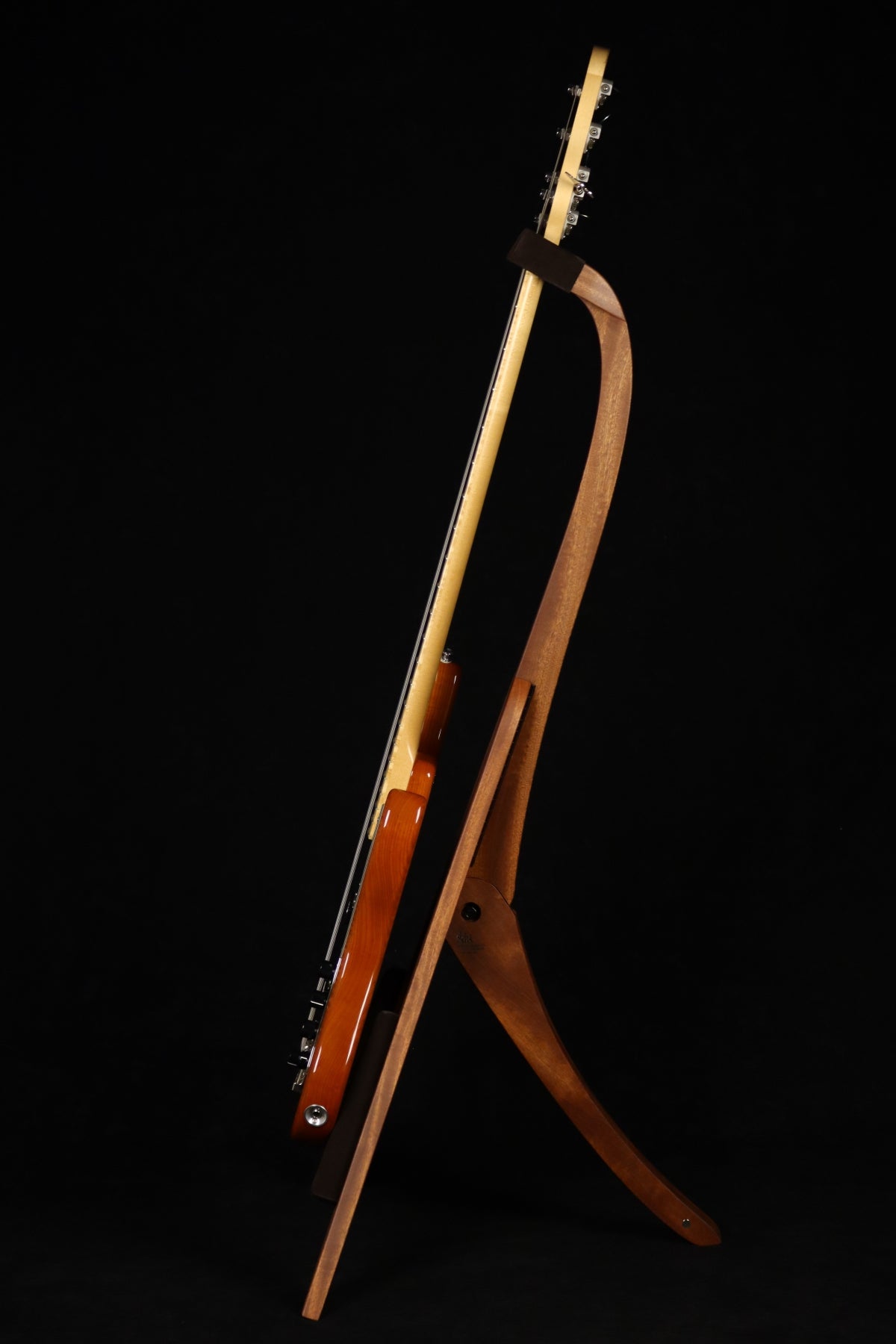 Folding sapele mahogany wood electric bass guitar floor stand full side image with Sadowsky 5 string bass