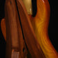 Folding sapele mahogany wood electric bass guitar floor stand closeup rear image