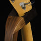 Folding walnut wood electric bass guitar floor stand closeup rear yoke detail image