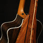 Folding bubinga rosewood and curly maple wood guitar floor stand closeup rear image with Taylor guitar