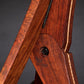 Folding bubinga rosewood and curly maple wood guitar floor stand joinery detail image