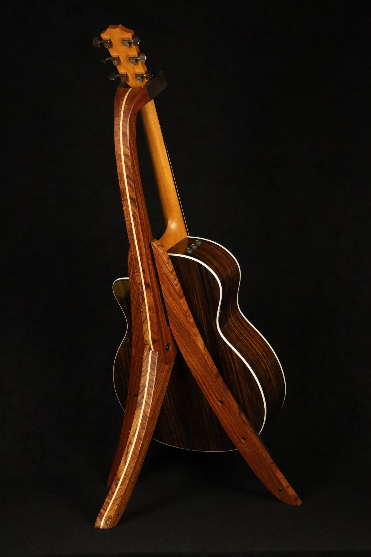 Folding bubinga rosewood and curly maple wood guitar floor stand full rear image with Taylor guitar