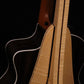 Folding curly maple and walnut wood guitar floor stand closeup rear image with Taylor guitar
