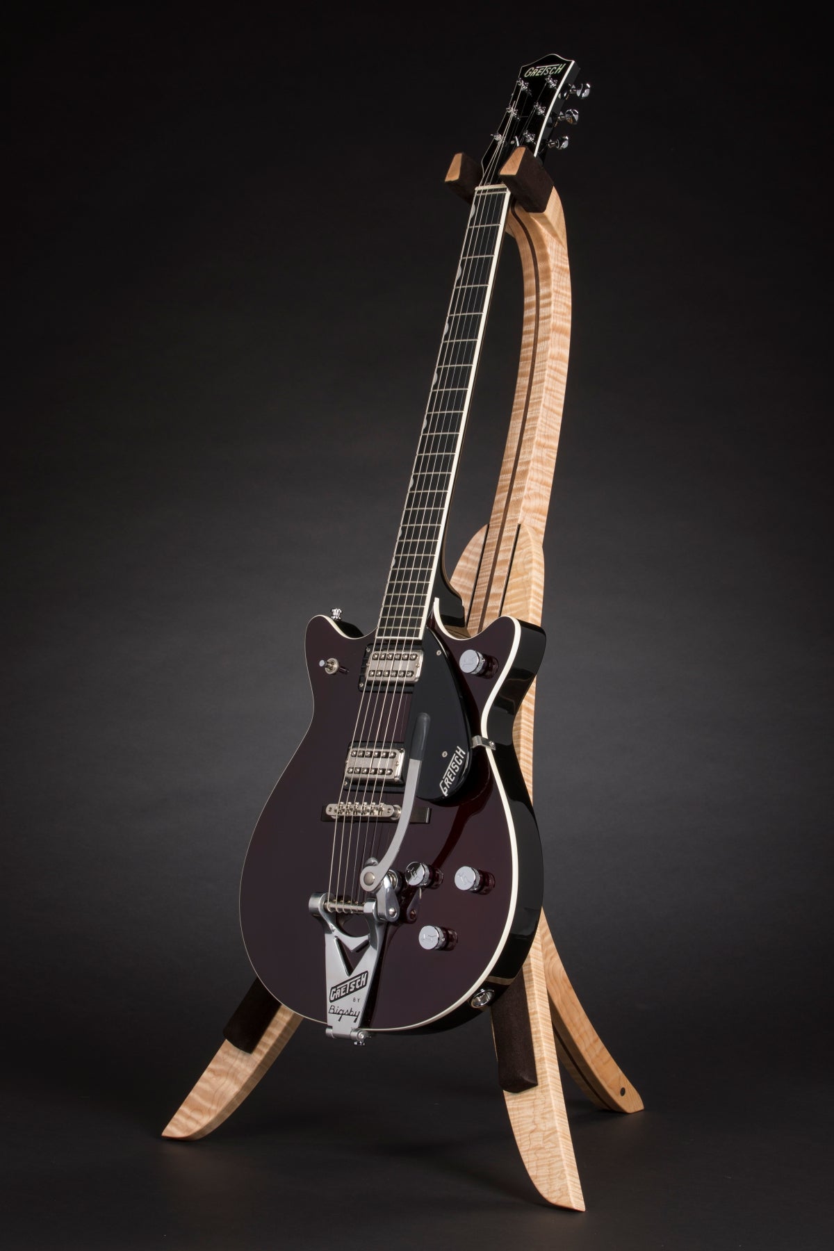 Folding curly maple and walnut wood guitar floor stand full front image with Gretsch guitar