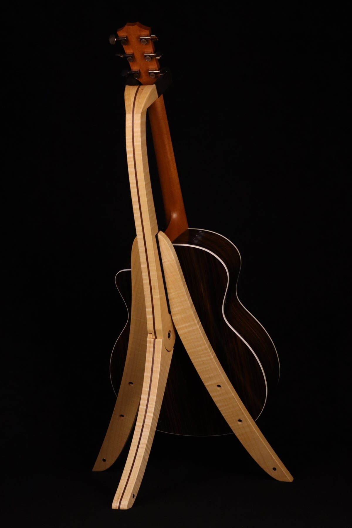 Folding curly maple and walnut wood guitar floor stand full rear image with Taylor guitar