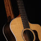 Folding chechen Caribbean rosewood and curly maple wood guitar floor stand closeup front image with Taylor guitar