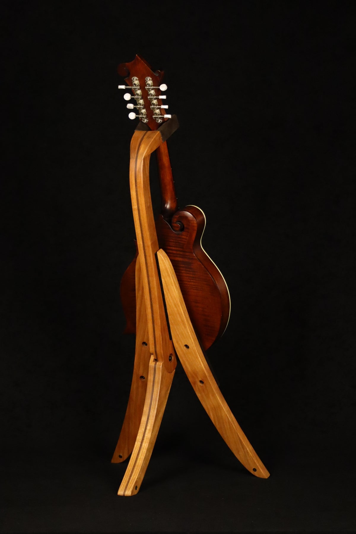 Folding cherry and walnut wood mandolin floor stand full rear image with Eastman mandolin