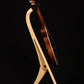 Folding curly maple and walnut wood mandolin floor stand full side image with Eastman mandolin