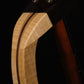 Folding curly maple and walnut wood mandolin floor stand yoke detail image with Eastman mandolin