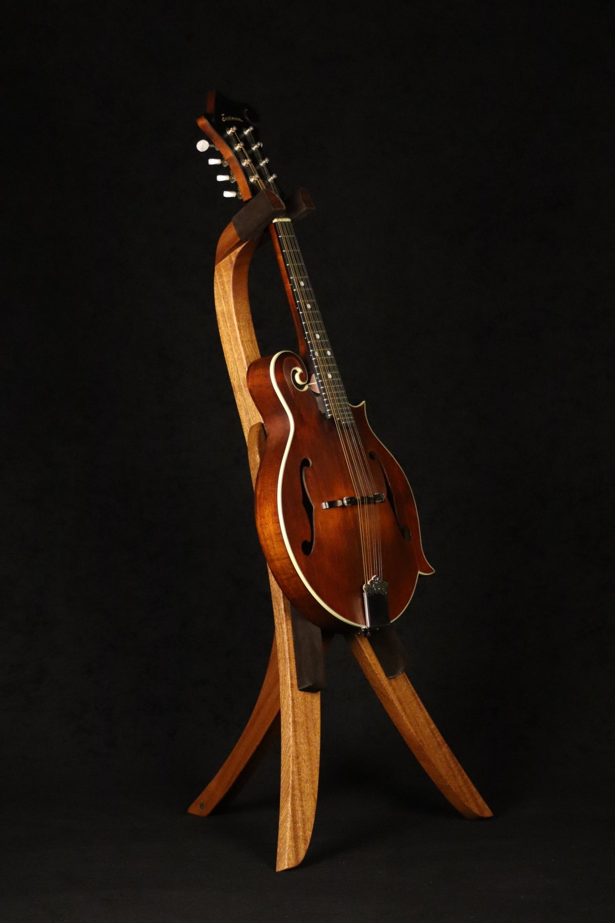 Folding sapele mahogany wood mandolin floor stand full front image with Eastman mandolin