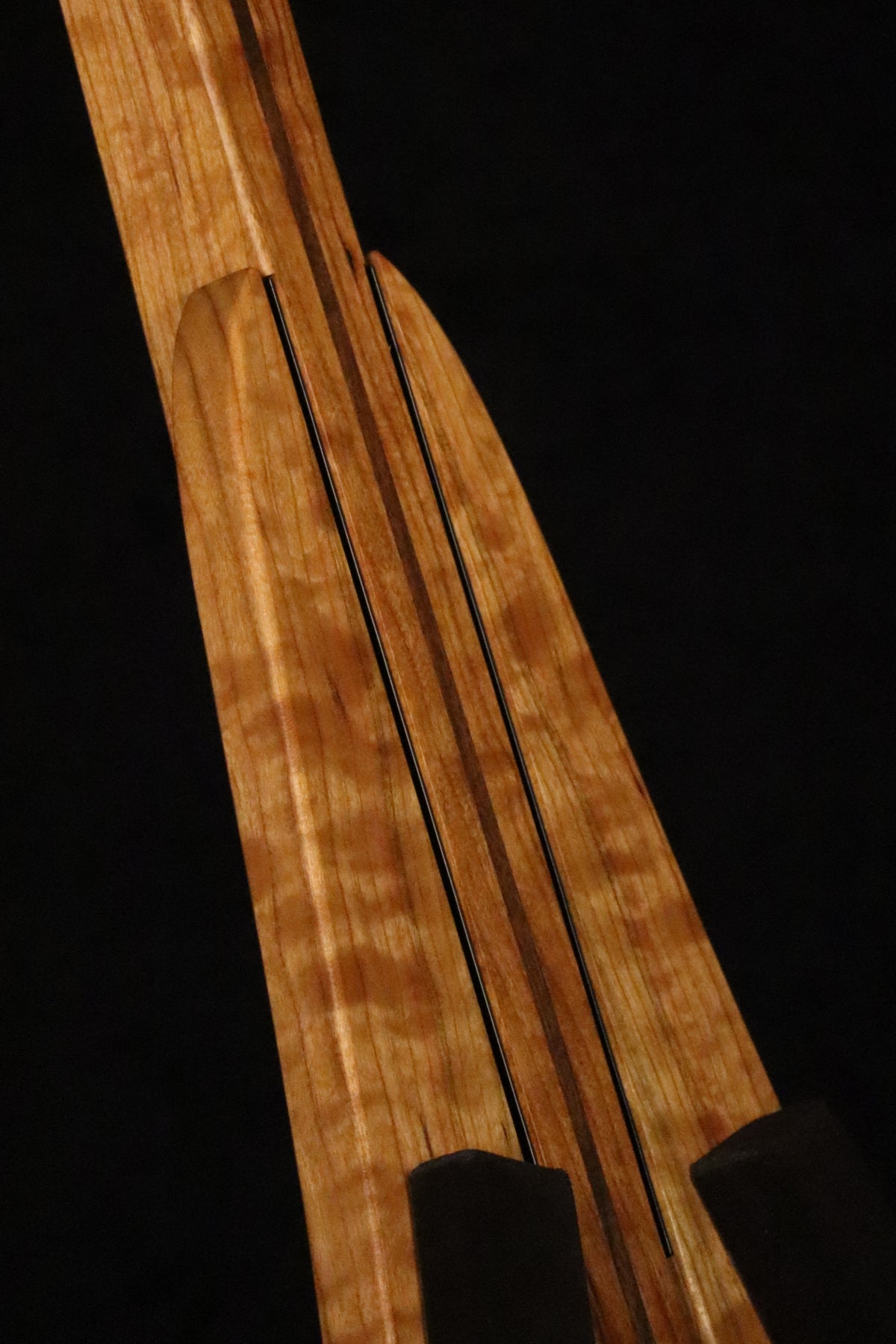 Folding cherry and walnut wood ukulele floor stand closeup front image