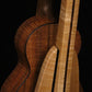 Folding curly maple and walnut wood ukulele floor stand closeup rear image with Martin ukulele