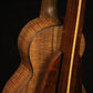 Folding chechen Caribbean rosewood and curly maple wood ukulele floor stand closeup rear image with Martin ukulele