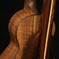Folding morado Bolivian rosewood pau fero and curly maple wood ukulele floor stand closeup rear image with Martin ukulele