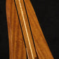 Folding sheuda ovangkol and curly maple wood guitar stand closeup front image