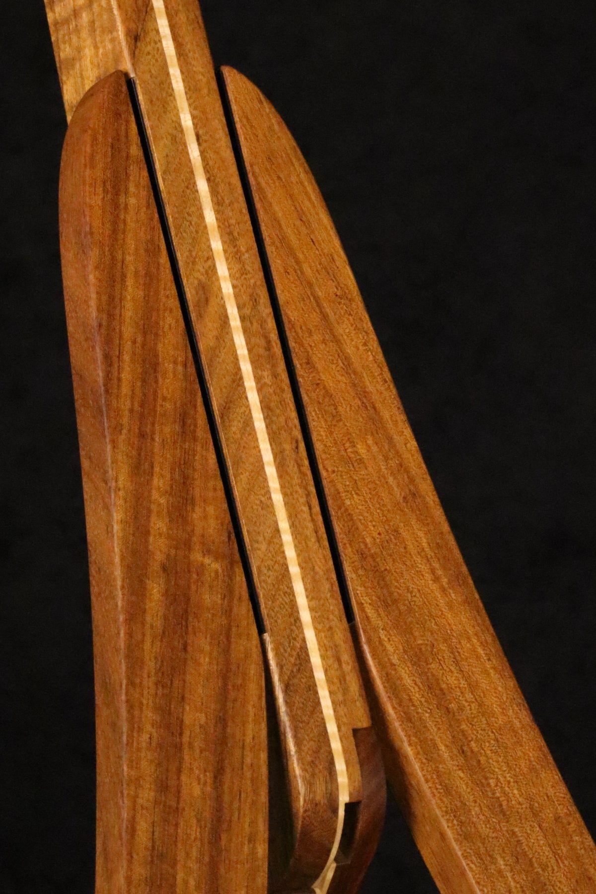 Folding sheuda ovangkol and curly maple wood guitar stand closeup front image