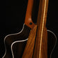 Folding sheuda ovangkol and curly maple wood guitar stand closeup rear image with Taylor guitar