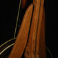 Folding cherry and walnut wood banjo floor stand closeup rear image with Alvarez banjo