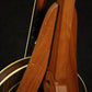 Folding sapele mahogany wood banjo floor stand closeup rear image with Alvarez banjo