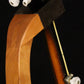 Folding cherry wood banjo floor stand yoke detail image with Alvarez banjo