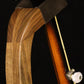 Folding walnut wood banjo floor stand yoke detail image with Alvarez banjo