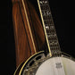 Folding walnut and curly maple wood banjo floor stand closeup front image with Alvarez banjo