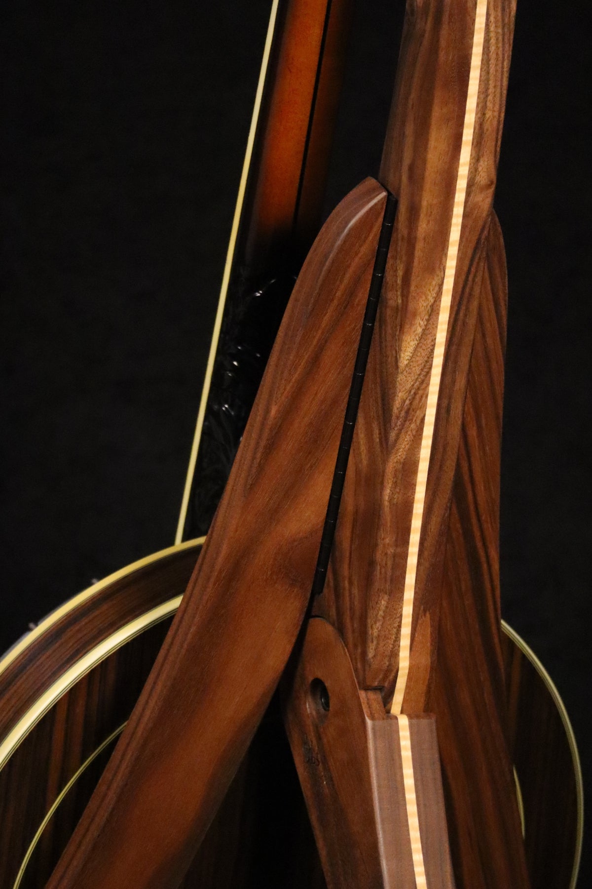 Folding walnut and curly maple wood banjo floor stand closeup rear image with Alvarez banjo