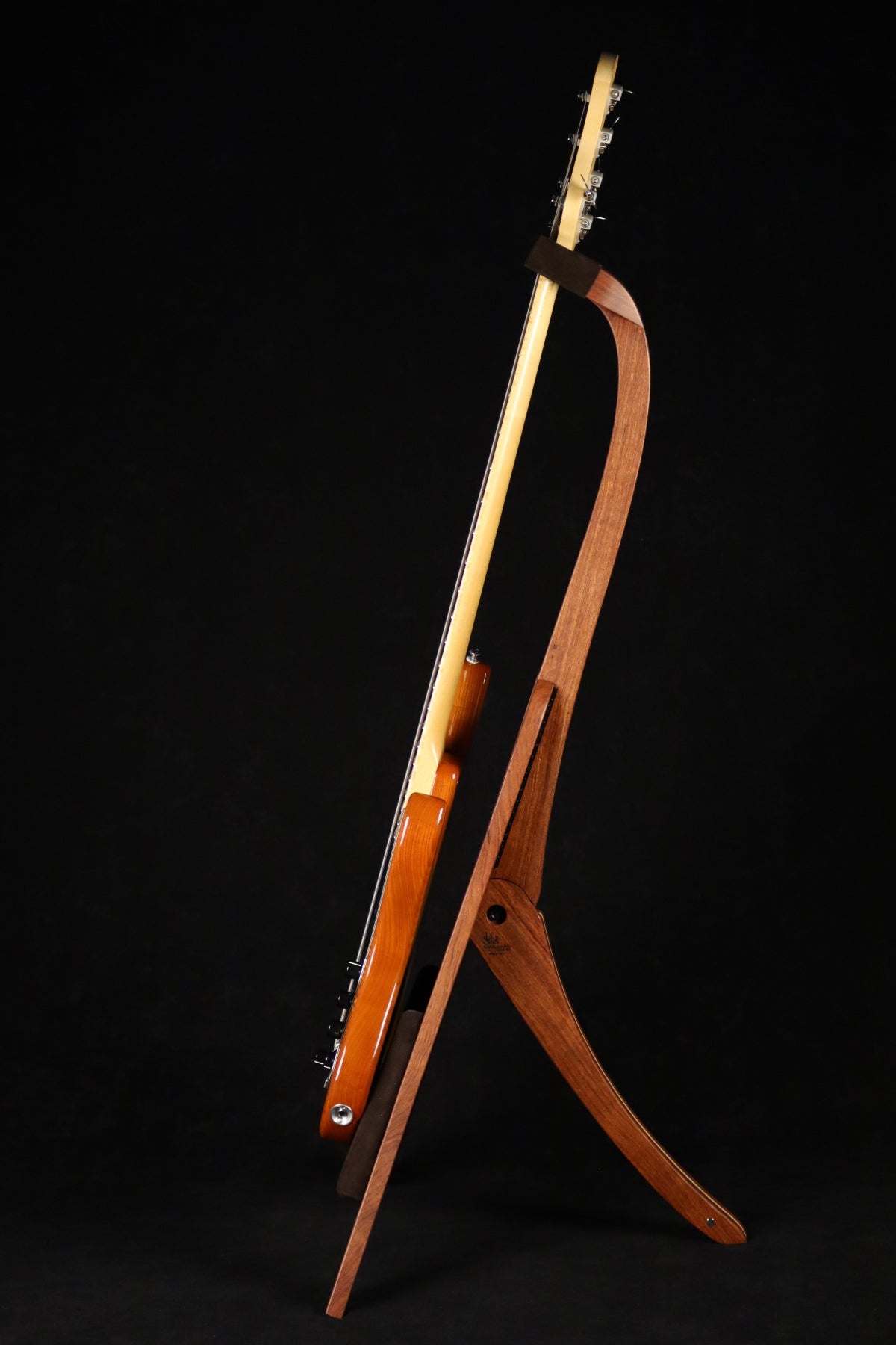 Folding bubinga rosewood and curly maple wood electric bass guitar floor stand full side image with Sadowsky 5 string bass
