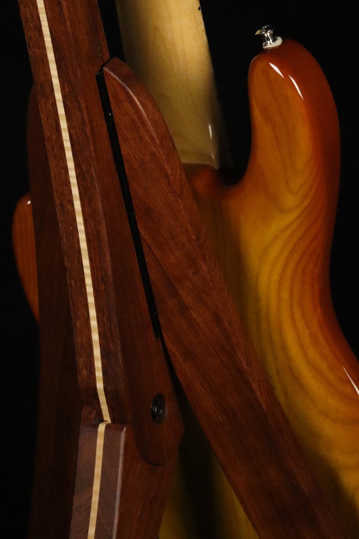 Folding bubinga rosewood and curly maple wood electric bass guitar floor stand closeup rear image