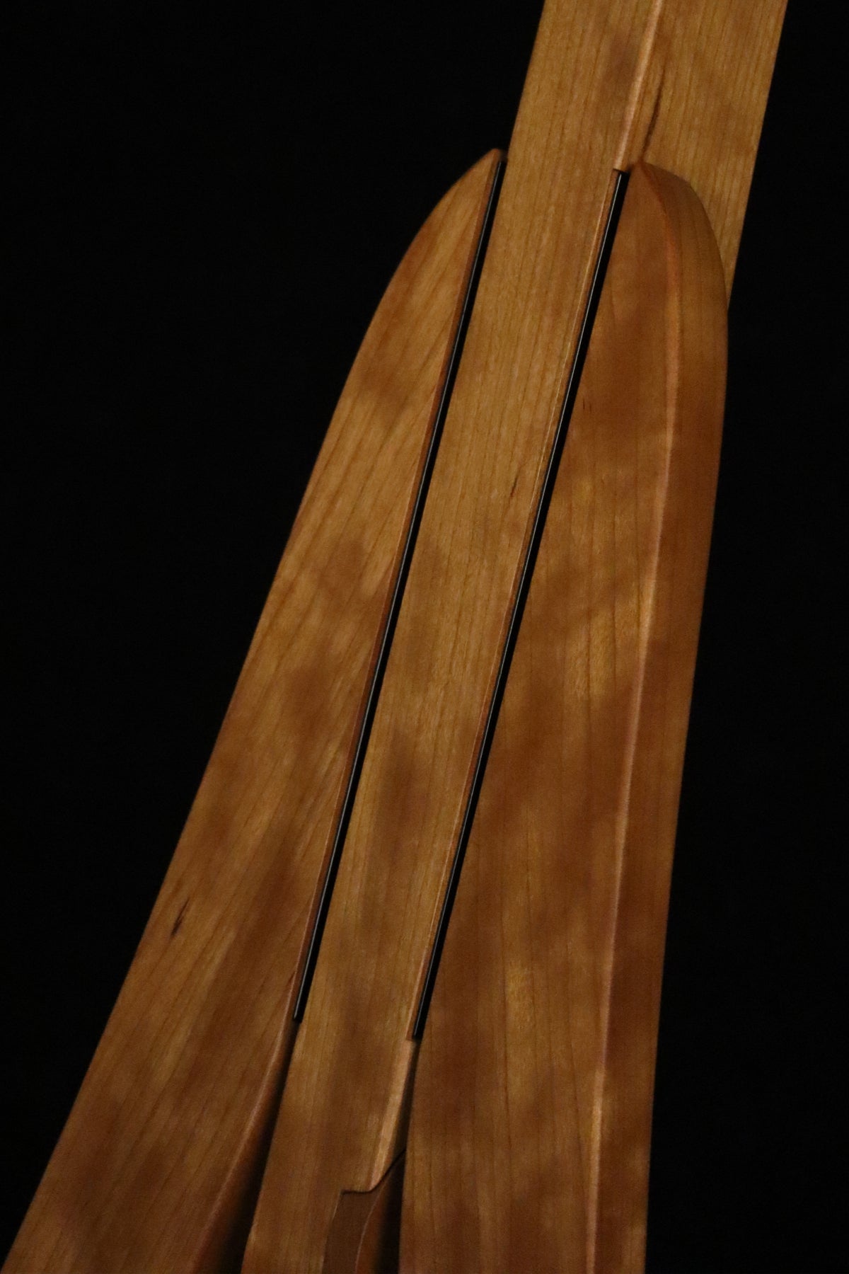 Folding cherry wood electric bass guitar floor stand closeup front image