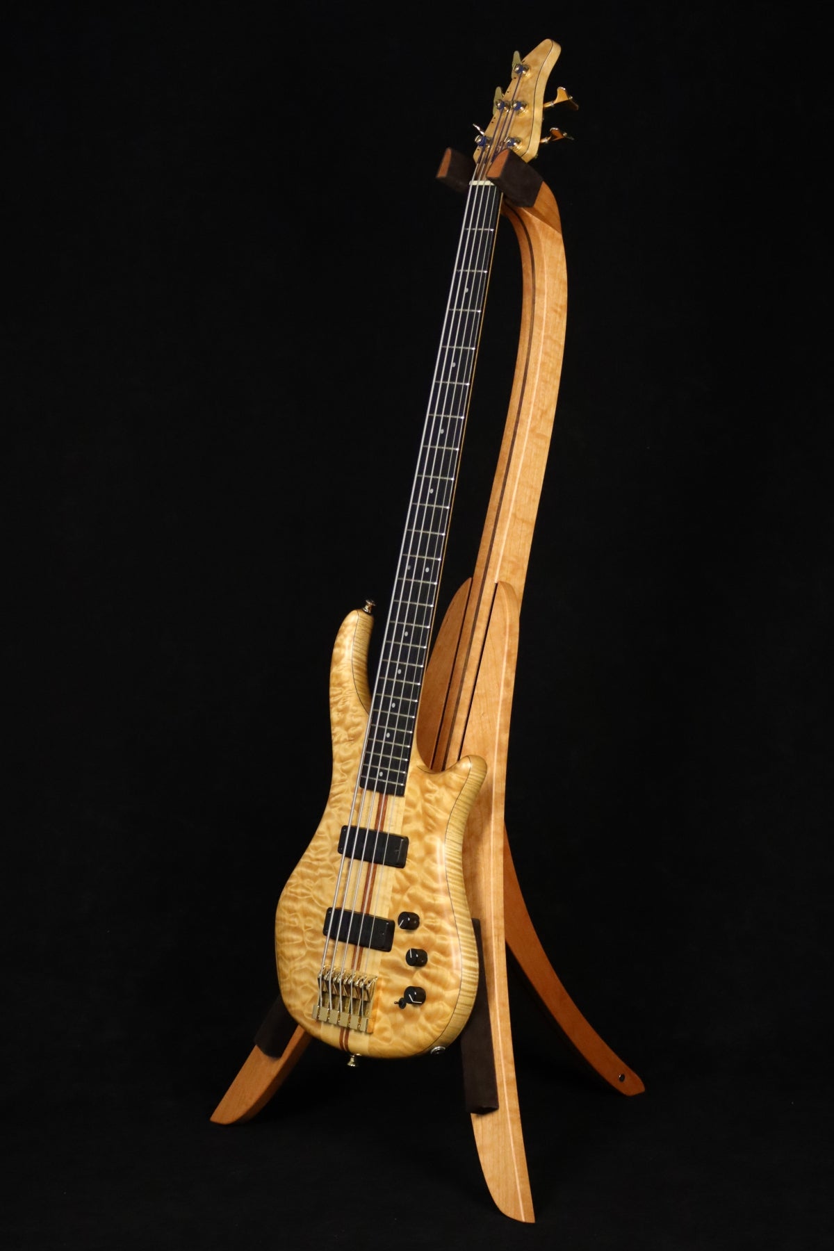 Folding cherry and walnut wood electric bass guitar floor stand full front image with Pedulla 5 string bass