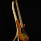 Folding curly maple and walnut wood electric bass guitar floor stand full front image with Sadowsky 5 string bass