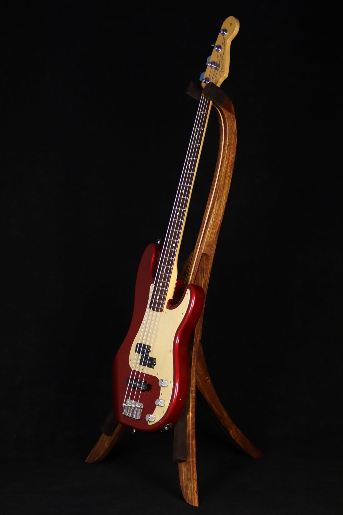 Folding chechen Caribbean rosewood and curly maple wood electric bass guitar floor stand full front image with Fender Jazz 4 string bass