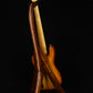 Folding chechen Caribbean rosewood and curly maple wood electric bass guitar floor stand full rear image with Sadowsky 5 string bass