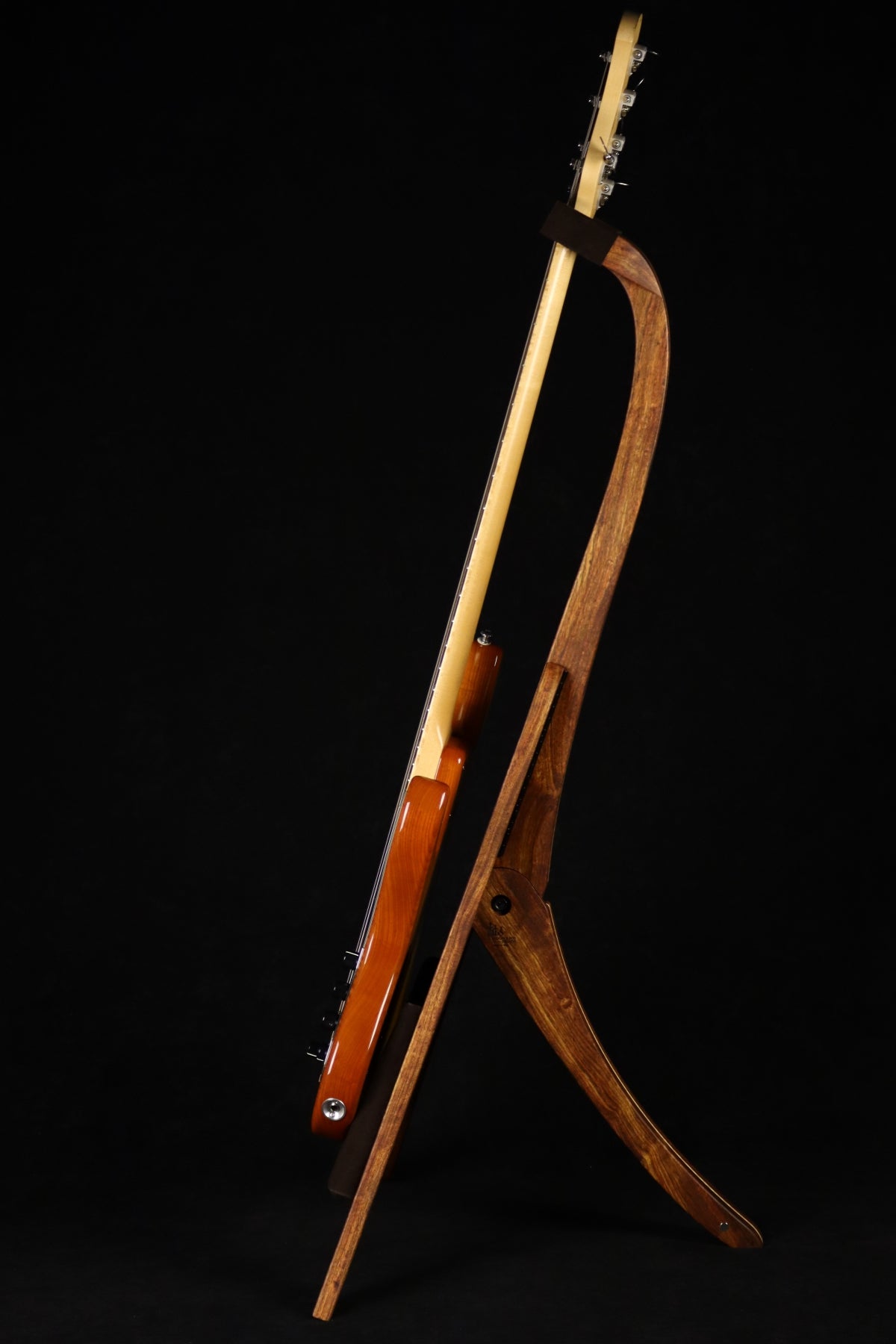 Folding chechen Caribbean rosewood and curly maple wood electric bass guitar floor stand full side image with Sadowsky 5 string bass