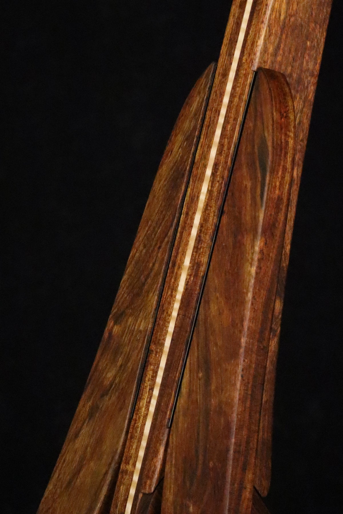 Folding chechen Caribbean rosewood and curly maple wood electric bass guitar floor stand closeup front image