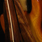 Folding chechen Caribbean rosewood and curly maple wood electric bass guitar floor stand closeup rear image
