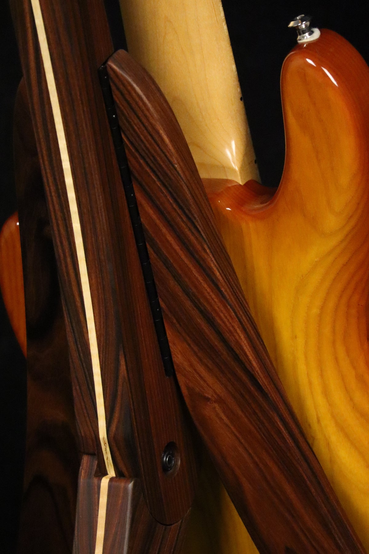 Folding morado Bolivian rosewood and curly maple wood electric bass guitar floor stand closeup rear image